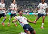 englands-jude-bellingham-10-celebrates-with-teammates-after-GFKIHWQVNRCL3MRD6HWFOSCBRY