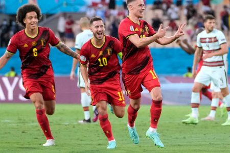 Soccer Football - Euro 2020 - Round of 16 - Belgium v Portugal - La Cartuja Stadium, Seville, Spain - June 27, 2021  Belgium's Thorgan Hazard celebrates scoring their first goal Pool via REUTERS/Thanassis Stavrakis