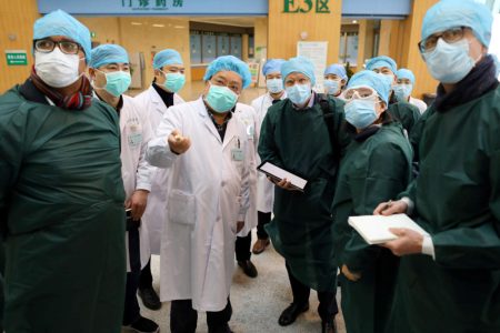experts-from-china-and-the-world-health-organization-who-joint-team-wearing-face-masks-visit-the-wuhan-tongji-hospital-in-wuhan-reuters