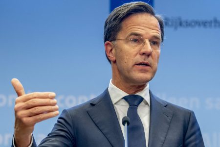 Dutch outgoing Prime Minister Mark Rutte gives a press conference about new coronavirus measures to stop the spread of the Omicron variant, in The Hague, on December 18, 2021. - Netherlands will be placed under "lockdown" for the Christmas period on December 19, 2021 in an attempt to stem a sharp rise in cases of the Omicron variant, Dutch Prime Minister Mark Rutte announced on December 18, 2021. - Netherlands OUT (Photo by Robin UTRECHT / ANP / AFP) / Netherlands OUT (Photo by ROBIN UTRECHT/ANP/AFP via Getty Images)