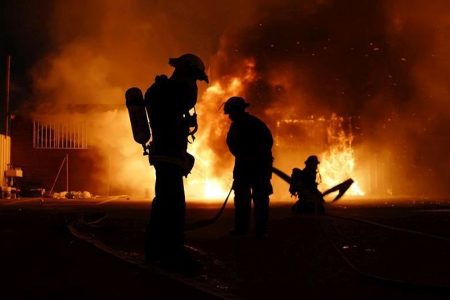 Silhouette of firefighters