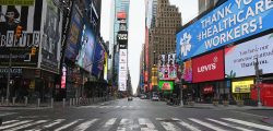 View of an almost empty Time Square on April 03, 2020 in New York. - In New York, the epicenter of the US outbreak, Mayor Bill de Blasio urged residents to cover their faces when outside and Vice President Mike Pence said there would be a recommendation on the use of masks by the general public in the next few days. (Photo by Angela Weiss / AFP) (Photo by ANGELA WEISS/AFP via Getty Images)