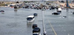 DUBAI, UNITED ARAB EMIRATES - APRIL 18:  A general view of abandoned vehicles on a flooded highway can be seen on April 18, 2024 in Dubai, United Arab Emirates. Atypically heavy rains in the UAE on Monday and Tuesday caused flooding, flight cancellations, and school closures. UAE authorities have denied that their cloud-seeding operations were to blame for the extreme rainfall. (Photo by Francois Nel/Getty Images)