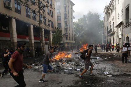 https___cdn.cnn.com_cnnnext_dam_assets_191023105419-state-of-emergency-remains-as-demonstrations-and-looting-continues-in-chile