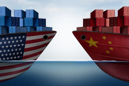 China United States trade and American tariffs as two opposing cargo ships as an economic  taxation dispute over import and exports concept as a 3D illustration.