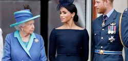 LONDON, UNITED KINGDOM - JULY 10: (EMBARGOED FOR PUBLICATION IN UK NEWSPAPERS UNTIL 24 HOURS AFTER CREATE DATE AND TIME) Queen Elizabeth II, Meghan, Duchess of Sussex and Prince Harry, Duke of Sussex watch a flypast to mark the centenary of the Royal Air Force from the balcony of Buckingham Palace on July 10, 2018 in London, England. The 100th birthday of the RAF, which was founded on on 1 April 1918, was marked with a centenary parade with the presentation of a new Queen's Colour and flypast of 100 aircraft over Buckingham Palace. (Photo by Max Mumby/Indigo/Getty Images)