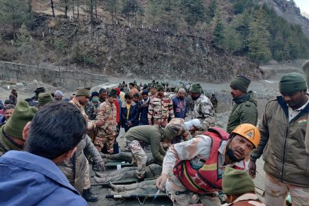 Members of Indo-Tibetan Border Police (ITBP) tend to people rescued after a Himalayan glacier broke and swept away a small hydroelectric dam, in Chormi village in Tapovan in the northern state of Uttarakhand, India, February 7, 2021. REUTERS/Stringer NO ARCHIVES. NO RESALES.