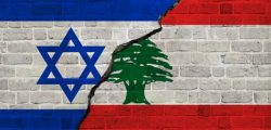 Israel and Lebanon flags together. Israel and Lebanon conflict.