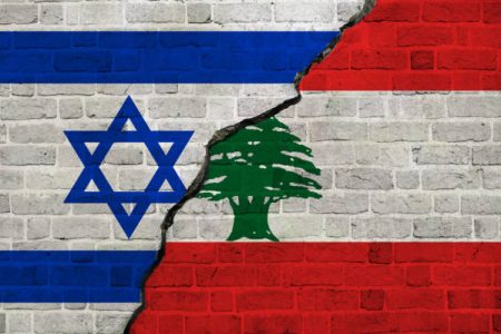 Israel and Lebanon flags together. Israel and Lebanon conflict.