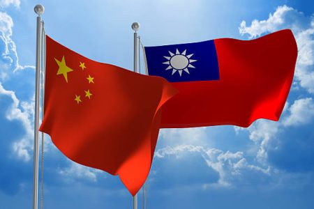 Flags from China and Taiwan flying side by side for important talks.