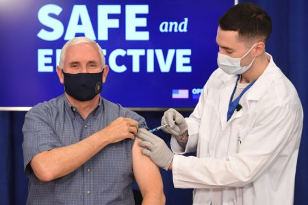 US Vice President Mike Pence receives the COVID-19 vaccine in the Eisenhower Executive Office Building in Washington, DC, December 18, 2020. (Photo by SAUL LOEB / AFP)