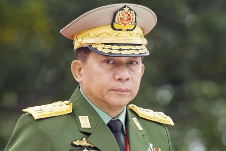 Myanmar's Chief Senior General Min Aung Hlaing, commander-in-chief of the Myanmar armed forces, arrives to pay his respects to Myanmar independence hero General Aung San and eight others assassinated in 1947, during a ceremony to mark the 71th anniversary of Martyrs' Day in Yangon on July 19, 2018.
Myanmar observes the 71th anniversary of Martyrs' Day, marking the assassination of independence heroes including Aung San Suu Kyi's father, who helped end British colonial rule. / AFP PHOTO / YE AUNG THU