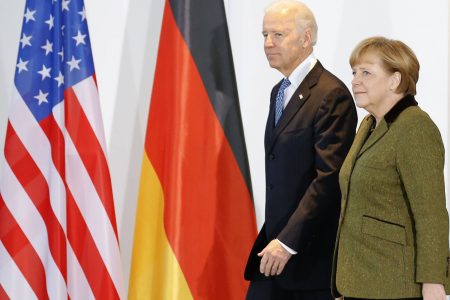 German Chancellor Angela Merkel and U.S. Vice President Joe Biden arrive to make a statement to the media before talks in Berlin February 1, 2013. REUTERS/Tobias Schwarz (GERMANY - Tags: POLITICS)