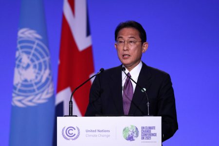 Japan's Prime Minister Fumio Kishida speaks during the UN Climate Change Conference (COP26) in Glasgow, Scotland, Britain, November 2, 2021. Adrian Dennis/Pool via REUTERS