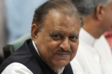 Pakistan candidate for the upcoming presidential election of the ruling Pakistan Muslim League-N (PMLN), Mamnoon Hussain arrives to submits his nomination paper at the High Court in Islamabad on July 24, 2013. Pakistan's Supreme Court on July 24 revised the date for the presidential election, asking the election commission to hold it on July 30 instead of August 6. The court made the order as many of the lawmakers who will elect a replacement for President Asif Ali Zardari will be paying pilgrimages or offering special prayers on August 6 for the Islamic holy month of Ramadan, which ends a few days later.  AFP PHOTO /AAMIR QURESHI        (Photo credit should read AAMIR QURESHI/AFP/Getty Images)