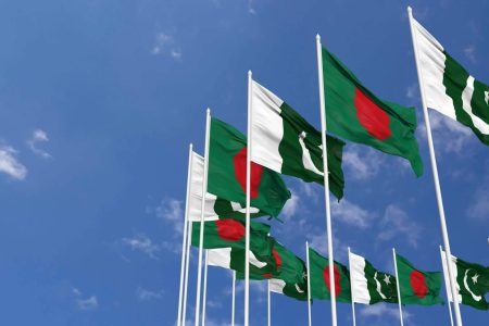 pakistan-and-bangladesh-flags-waving-together-in-the-sky-seamless-loop-in-wind-space-on-left-side-for-design-or-information-3d-rendering-free-video