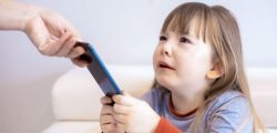 parent-taking-kids-phone-away-smaller-adobe