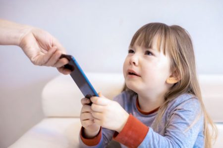 parent-taking-kids-phone-away-smaller-adobe