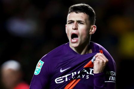 OXFORD, ENGLAND - SEPTEMBER 25:  Phil Foden of Manchester City celebrates after scoring his team's third goal during the Carabao Cup Third Round match between Oxford United and Manchester City at Kassam Stadium on September 25, 2018 in Oxford, England.  (Photo by Julian Finney/Getty Images)