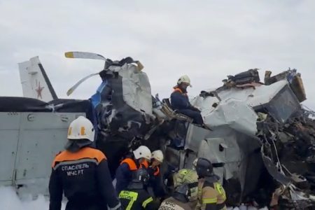 Emergency specialists work at the crash site of the L-410 plane near the town of Menzelinsk in the Republic of Tatarstan, Russia October 10, 2021, in this still image taken from video. Russia's Emergencies Ministry/Handout via REUTERS