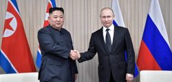 putin-and-kim-jung-un-scaled