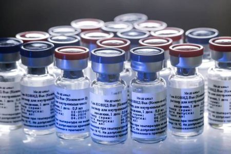 In this handout photo taken on Thursday, Aug. 6, 2020, and provided by Russian Direct Investment Fund, a new vaccine is on display at the Nikolai Gamaleya National Center of Epidemiology and Microbiology in Moscow, Russia. Russia on Tuesday, Aug. 11 became the first country to approve a coronavirus vaccine for use in tens of thousands of its citizens despite international skepticism about injections that have not completed clinical trials and were studied in only dozens of people for less than two months. (Alexander Zemlianichenko Jr/ Russian Direct Investment Fund via AP)