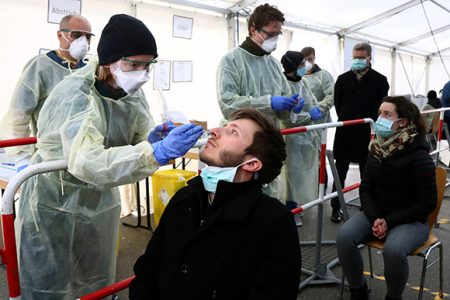 Mandatory Credit: Photo by Matthias Schrader/AP/Shutterstock (10591613b)
Medical employees demonstrate testing, at a coronavirus test center for public service employees, during a media presentation in Munich, Germany, . For most people, the new coronavirus causes only mild or moderate symptoms, such as fever and cough. For some, especially older adults and people with existing health problems, it can cause more severe illness, including pneumonia
Virus Outbreak , Munich, Germany - 23 Mar 2020