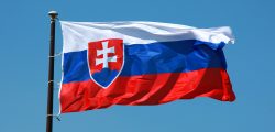 slovakia-flag-fluttering-right-clear-blue-sky
