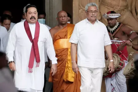 sri-lankas-prime-minister-mahinda-rajapaksa-and-his-brother-and-sri-lankas-president-gotabaya-rajapaksa-are-seen-during-his-during-the-swearing-in-ceremony-as-the-new-prime-minister-at-kelani