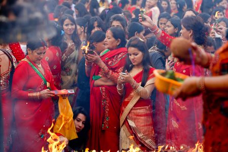 Women light  incense during Haritalika Teej festival celebrations  at Pashupatinath ,Katmandu, on Wednesday, September 16, 2015. Women celebrate the festival by fasting, singing, dancing and offering prayers to Lord Shiva.Photo : Dinesh Gole / Nagarik / Republica /