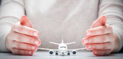travel-insurance-hands-plane