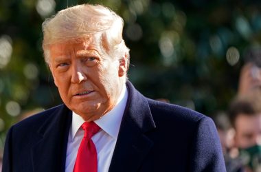 FILE - President Donald Trump walks to board Marine One on the South Lawn of the White House on Jan. 12, 2021, in Washington. Media critic Brian Stelter is updating his book "Hoax: Donald Trump, Fox News and the Dangerous Distortion of Truth" in preparation for the paperback edition. The changes reflect the end of Trump's presidency and the false claims of voter fraud and the rise of Tucker Carlson to become Fox's most prominent personality. Announced on Sunday, Feb, 21, 2021, the revised edition will be released in June. (AP Photo/Gerald Herbert, File )