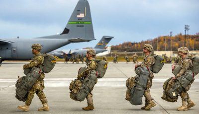 Army paratroopers with the 4th Infantry Brigade Combat Team (Airborne), 25th Infantry Division, U.S. Army Alaska, board multiple Air Force C-130J Hercules and C-17 Globemaster III aircraft while conducting an airborne assault during exercise Arctic Anvil 19-01 at Joint Base Elmendorf-Richardson, Alaska, Oct. 9, 2018. Arctic Anvil 19-01 is a joint, multi-national, force-on-force training exercise designed to provide the 1st Stryker Brigade Combat Team a tough, realistic training event that validates their ability to fight and win as a combined arms team in preparation for their rotation at the Army’s National Training Center in California early next year. Over 400 Spartan paratroopers were transported by multiple Air Force C-130J Super Hercules aircraft out of Little Rock Air Force Base, Ark., and Yokota Air Base, Japan, in addition to multiple C-17 Globemaster III’s from JBER and Joint Base Pearl Harbor-Hickam, Hawaii. (U.S. Air Force photo by Alejandro Peña)